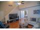 Inviting living room with vaulted ceilings, hardwood floors, and cozy seating arrangement, perfect for relaxation at 10202 Orchard Grass Ct, Charlotte, NC 28278