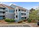 Beautiful condo building featuring multiple balconies, offering outdoor living spaces at 1033 Southwest Dr, Davidson, NC 28036