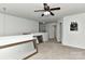 Large bonus room with carpeting, ceiling fan, and entry to other spaces at 1037 Hammond Dr, Matthews, NC 28104