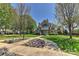 Stately building featuring manicured lawn and beautiful landscaping at 1037 Hammond Dr, Matthews, NC 28104