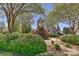 Beautifully landscaped entrance with charming gazebo and inviting views of surrounding homes at 1037 Hammond Dr, Matthews, NC 28104