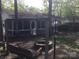 The property includes a screened porch, fire pit, and additional shade for outdoor enjoyment at 108 Captains Ct # B116, Mount Gilead, NC 27306
