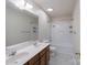 Bathroom featuring a double sink vanity, tub, and shower at 1144 Spicewood Pines Rd, Fort Mill, SC 29708