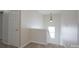 Bright upstairs hallway with a pendant light above the stairs at 1144 Spicewood Pines Rd, Fort Mill, SC 29708