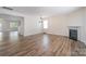 Spacious living room features a fireplace, hardwood floors, and natural light at 1144 Spicewood Pines Rd, Fort Mill, SC 29708