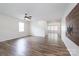 Expansive living room with hardwood floors, a ceiling fan, and natural light at 1144 Spicewood Pines Rd, Fort Mill, SC 29708