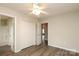 Bedroom with closet and door to bathroom with tub at 11623 Black Maple Ave, Charlotte, NC 28269