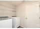 Laundry room with front load washer and dryer at 11623 Black Maple Ave, Charlotte, NC 28269