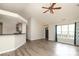 Bright, open-concept living area featuring a modern fireplace, vaulted ceilings, and easy access to the entryway at 11623 Black Maple Ave, Charlotte, NC 28269