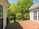 View of outdoor deck, perfect for entertaining with a nice view of the backyard at 11778 Crossroads Pl, Concord, NC 28025