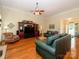 Spacious living room with hardwood floors and a ceiling fan at 11778 Crossroads Pl, Concord, NC 28025