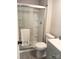 Clean bathroom features a new shower and toilet at 11817 Five Cedars Rd, Charlotte, NC 28226