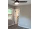 Cozy bedroom featuring a window and an open closet/doorway at 11817 Five Cedars Rd, Charlotte, NC 28226