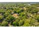 Aerial view of home highlighting the surrounding wooded neighborhood at 119 Meadowbrook Ln, Davidson, NC 28036