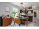 Charming dining area adjacent to the kitchen, perfect for meals and entertaining guests at 119 Meadowbrook Ln, Davidson, NC 28036