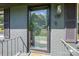 Close up view of front door with railing at 119 Meadowbrook Ln, Davidson, NC 28036