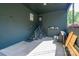 Garage with stairs leading to a door and storage area for outdoor equipment like a bicycle at 119 Meadowbrook Ln, Davidson, NC 28036