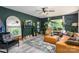 Spacious living room with modern furnishings, fireplace and hardwood floors at 119 Meadowbrook Ln, Davidson, NC 28036
