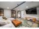 Finished basement featuring a comfortable seating area, TV, and stylish decor at 119 Meadowbrook Ln, Davidson, NC 28036