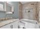 Bathroom features tiled shower, plant niche, modern vanity, and updated fixtures at 1216 Stourbridge Lion Dr, Charlotte, NC 28213