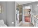 Bathroom with tiled glass shower and modern vanity at 1216 Stourbridge Lion Dr, Charlotte, NC 28213