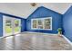 Bright bonus room with large windows, doors leading to outside, and vaulted ceilings at 1216 Stourbridge Lion Dr, Charlotte, NC 28213