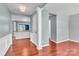 Inviting room with hardwood floors, offering versatile space for living and dining, with easy access to kitchen at 1216 Stourbridge Lion Dr, Charlotte, NC 28213
