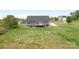 Expansive backyard with lush green grass perfect for outdoor activities and relaxation at 123 Pumice Dr, Statesville, NC 28625