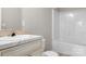 Bathroom with marble counter and combo bath-shower at 123 Pumice Dr, Statesville, NC 28625