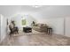 Staged bonus room featuring neutral tones, comfortable seating, and plenty of natural light at 123 Pumice Dr, Statesville, NC 28625