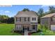 Charming two-story home with a landscaped front yard, brick accents, and dark shutters at 14018 Wilson Mac Ln, Charlotte, NC 28278