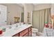 Bathroom features a tub/shower combo, vanity with storage, and neutral tones at 141 Ivy Creek Ln, Mooresville, NC 28115