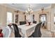 Elegant dining room featuring decorative china cabinets, table with seating, and soft lighting at 141 Ivy Creek Ln, Mooresville, NC 28115