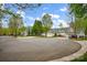 Neighborhood street with well-maintained homes and landscaped front yards, providing a welcoming community ambiance at 141 Ivy Creek Ln, Mooresville, NC 28115