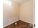 Small interior closet with neutral walls, hardwood flooring and updated lighting at 15133 Rocky Bluff Loop, Davidson, NC 28036