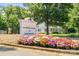 Welcome to Davidson College, nestled among trees and landscaping at 15133 Rocky Bluff Loop, Davidson, NC 28036