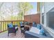 Relaxing deck area with outdoor furniture and wood privacy fence at 15133 Rocky Bluff Loop, Davidson, NC 28036