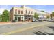 A street view of a charming main street shopping and dining district at 15133 Rocky Bluff Loop, Davidson, NC 28036