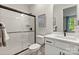 Modern bathroom with a glass-enclosed shower, white subway tile, and sleek fixtures at 167 Glenn Dr, Mooresville, NC 28115