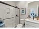 Modern bathroom featuring a glass shower, neutral colors, and a spacious vanity at 167 Glenn Dr, Mooresville, NC 28115