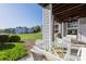 Relaxing back porch with water view and outdoor seating at 18700 Nautical Dr # 101, Cornelius, NC 28031