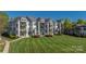 Low angle exterior view of community and manicured lawn at 18700 Nautical Dr # 101, Cornelius, NC 28031