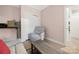 Comfortable living room with recliner and closet space at 18700 Nautical Dr # 101, Cornelius, NC 28031
