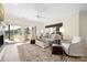 Cozy living room featuring a fireplace, comfortable seating, and access to the backyard at 18700 Nautical Dr # 101, Cornelius, NC 28031
