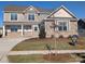 Charming two-story home with stone accents, manicured lawn, and an available for sale sign at 1921 Hendricks St, Rock Hill, SC 29732