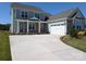 Charming two-story home featuring stone accents, a covered porch, and a spacious two-car garage at 2069 Fordhill St, Rock Hill, SC 29732