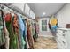 Spacious walk-in closet with ample storage space and a window at 207 Blythe Mill Rd, Waxhaw, NC 28173