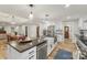 Spacious kitchen features an island, stainless steel appliances, and modern finishes at 207 Blythe Mill Rd, Waxhaw, NC 28173