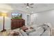 Comfortable living room with modern gray walls, vintage cabinet and comfy couch at 207 Blythe Mill Rd, Waxhaw, NC 28173