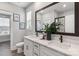 Bright bathroom with double vanity, framed mirror, and marble tiled shower at 2085 Fordhill St, Rock Hill, SC 29362